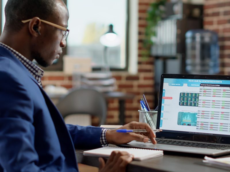 financial-analyst-following-real-time-stock-market-exchange-forex-global-trade-report-male-broker-analyzing-currency-statistics-with-profit-buy-sell-hedge-fund-index-money