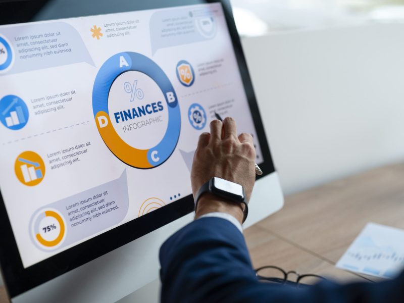person-office-analyzing-checking-finance-graphs